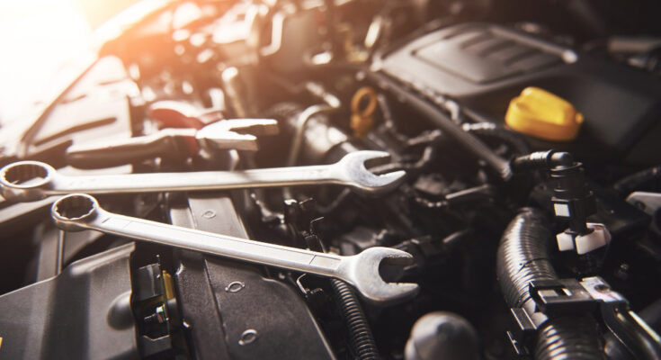 Mechanic Hand Checking Fixing Broken Car Car Service Garage