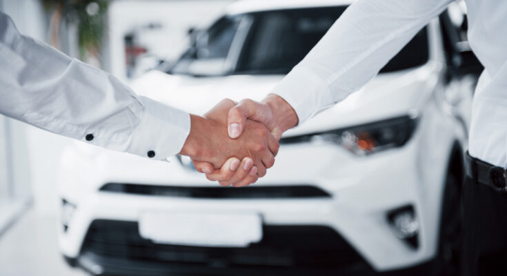 Close Up Sales Manager Black Suit Selling Car Customer