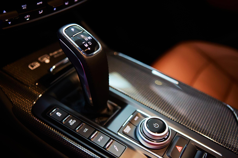 automatic-gear-stick-modern-car-multimedia-navigation-control-buttons-car-interior-details-transmission-shift-shallow-dof (2)