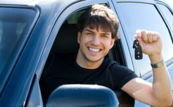 Portrait Successful Young Happy Man Showing Keys Sitting New Car