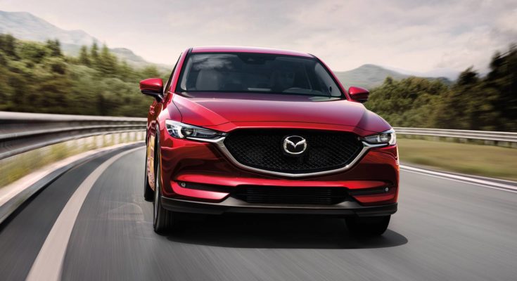 2017 Cx5 New Soul Red Crystal Front Grille Driving On Highway Mde Cx5 Gallery