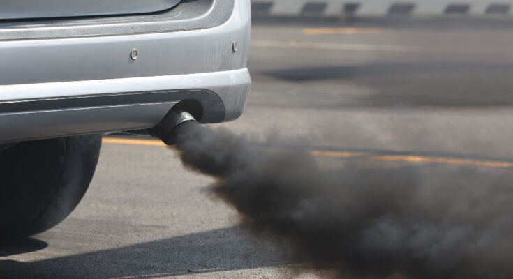 Air Pollution From Vehicle Exhaust Pipe Road