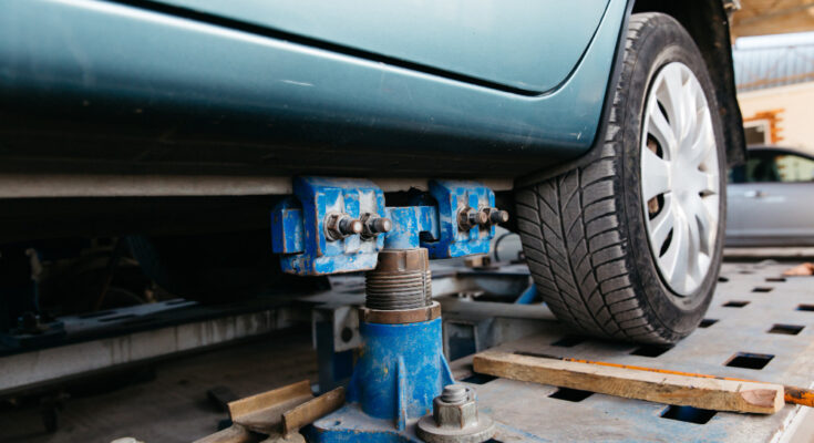 Blue Car Is Lifted Lift Repair Car Service Center