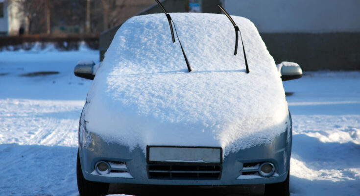 Car Street Town Covered With Snow Winter Season