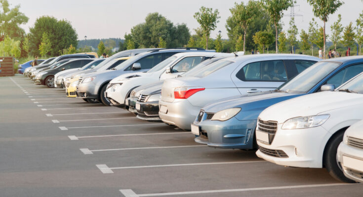 Cars Parking Lot Evening Light Sun