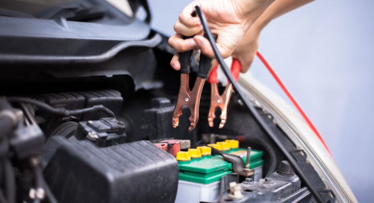 Charging Car Battery With Electricity Trough Jumper Cables