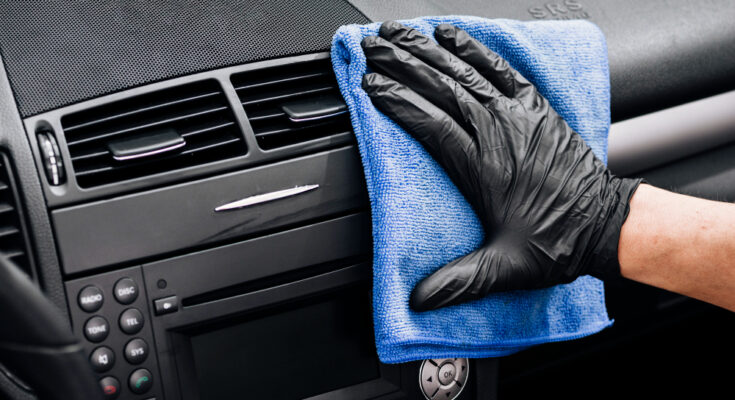 Close Up Person Cleaning Car Interior