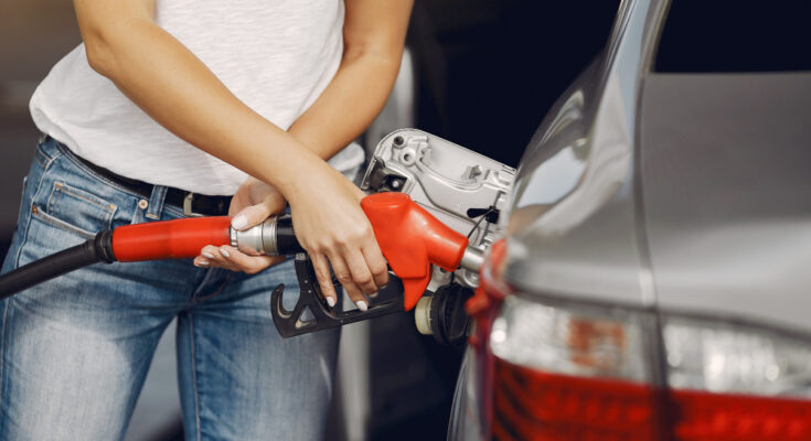 Elegant Woman Standing Gas Station