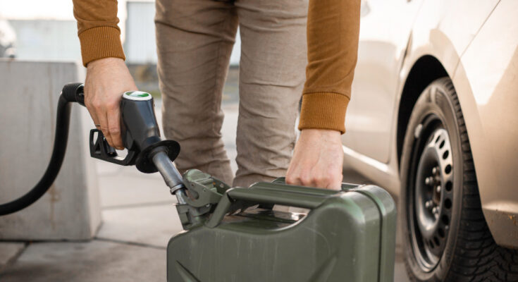 Man Refilling Canister With Fuel Petrol Station Close Up View Gasoline Diesel Is Getting More Expensive